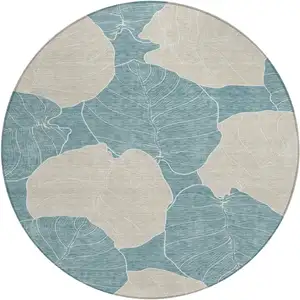 Photo of 8' Teal Blue And Ivory Round Floral Washable Indoor Outdoor Area Rug