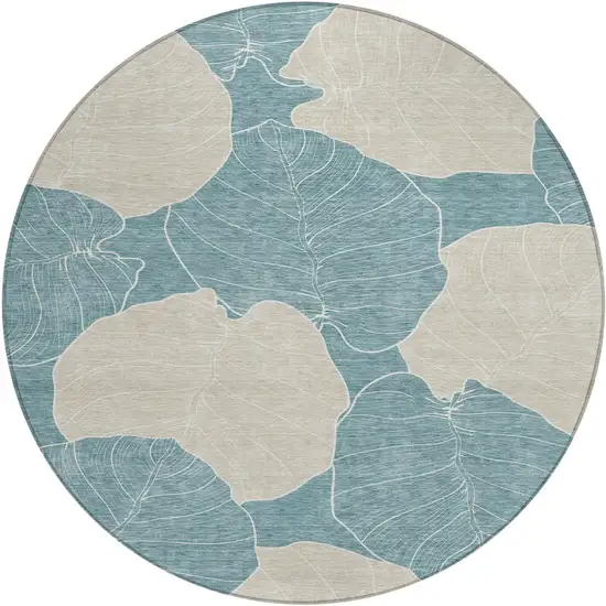 8' Teal Blue And Ivory Round Floral Washable Indoor Outdoor Area Rug Photo 1