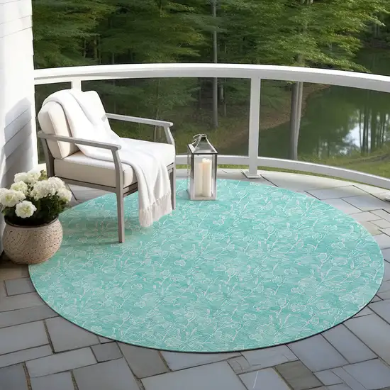 8' Teal Blue And Ivory Round Floral Washable Indoor Outdoor Area Rug Photo 7