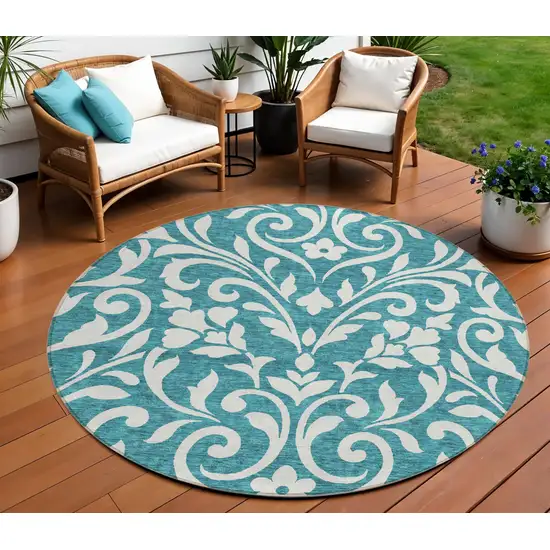 8' Teal Blue And Ivory Round Floral Washable Indoor Outdoor Area Rug Photo 1