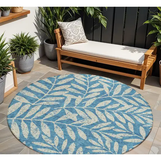 8' Teal Blue And Ivory Round Floral Washable Indoor Outdoor Area Rug Photo 1