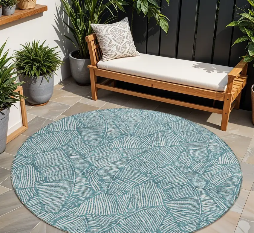 8' Teal Blue And Ivory Round Floral Washable Indoor Outdoor Area Rug Photo 1