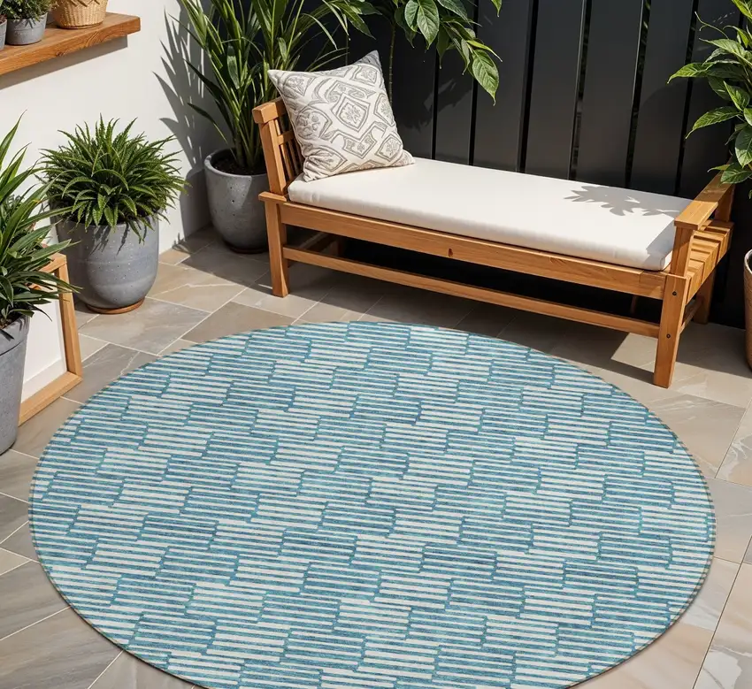 8' Teal Blue And Ivory Round Geometric Washable Indoor Outdoor Area Rug Photo 1