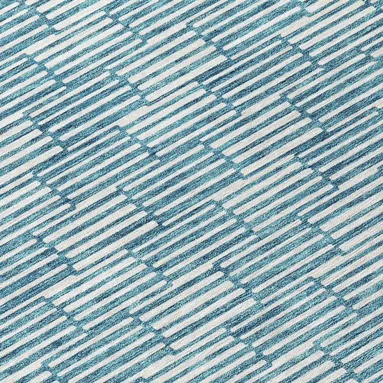 8' Teal Blue And Ivory Round Geometric Washable Indoor Outdoor Area Rug Photo 8
