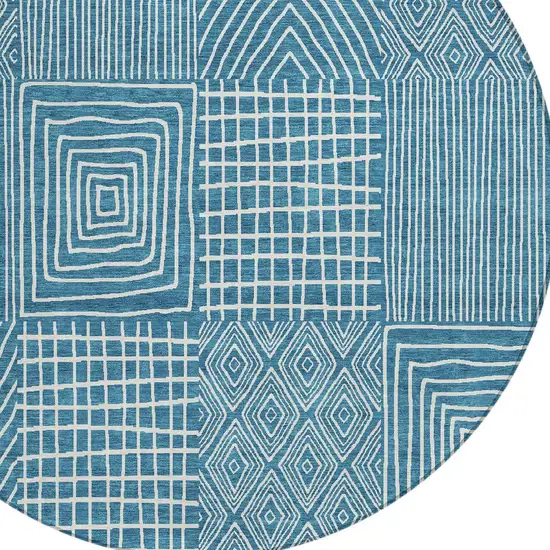8' Teal Blue And Ivory Round Geometric Washable Indoor Outdoor Area Rug Photo 5