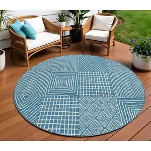 Photo of 8' Teal Blue And Ivory Round Geometric Washable Indoor Outdoor Area Rug