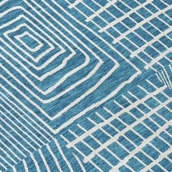8' Teal Blue And Ivory Round Geometric Washable Indoor Outdoor Area Rug Photo 4