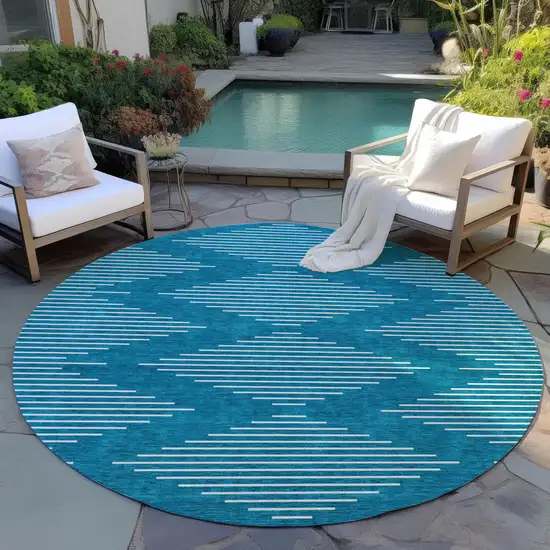 8' Teal Blue And Ivory Round Geometric Washable Indoor Outdoor Area Rug Photo 7