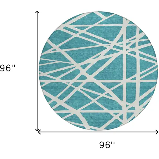 8' Teal Blue And Ivory Round Geometric Washable Indoor Outdoor Area Rug Photo 3