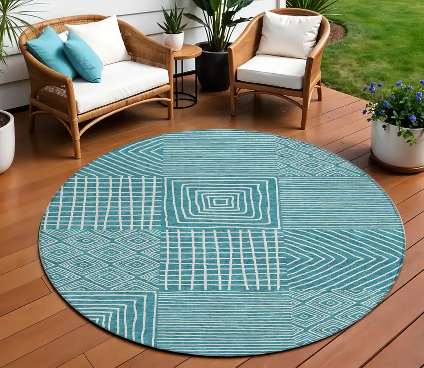 8' Teal Blue And Ivory Round Geometric Washable Indoor Outdoor Area Rug Photo 1