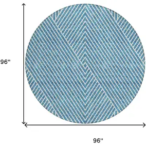 Photo of 8' Teal Blue And Ivory Round Geometric Washable Indoor Outdoor Area Rug