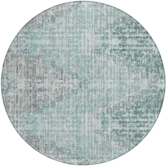 8' Teal Blue And Ivory Round Geometric Washable Indoor Outdoor Area Rug Photo 1