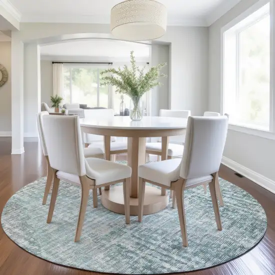 8' Teal Blue And Ivory Round Geometric Washable Indoor Outdoor Area Rug Photo 6