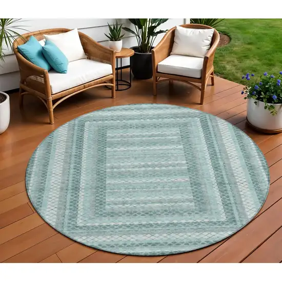 8' Teal Blue And Ivory Round Geometric Washable Indoor Outdoor Area Rug Photo 2