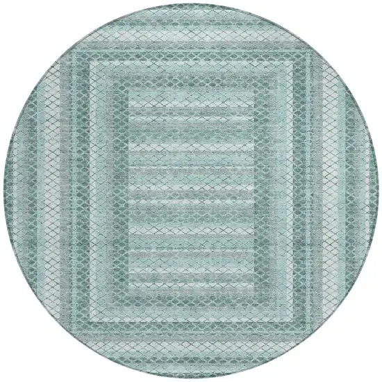 8' Teal Blue And Ivory Round Geometric Washable Indoor Outdoor Area Rug Photo 3
