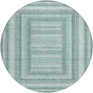 Photo of 8' Teal Blue And Ivory Round Geometric Washable Indoor Outdoor Area Rug