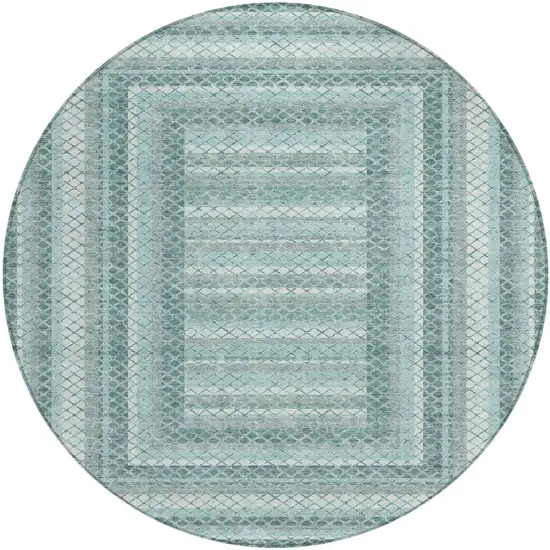 8' Teal Blue And Ivory Round Geometric Washable Indoor Outdoor Area Rug Photo 1