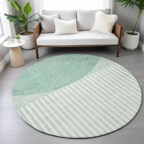 8' Teal Blue And Ivory Round Geometric Washable Indoor Outdoor Area Rug Photo 7