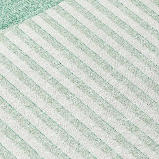 8' Teal Blue And Ivory Round Geometric Washable Indoor Outdoor Area Rug Photo 9