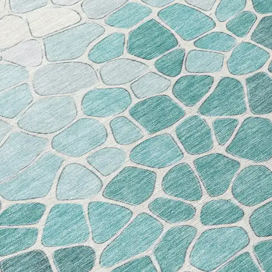 8' Teal Blue And Ivory Round Geometric Washable Indoor Outdoor Area Rug Photo 9