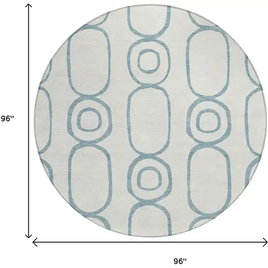 8' Teal Blue And Ivory Round Geometric Washable Indoor Outdoor Area Rug Photo 3