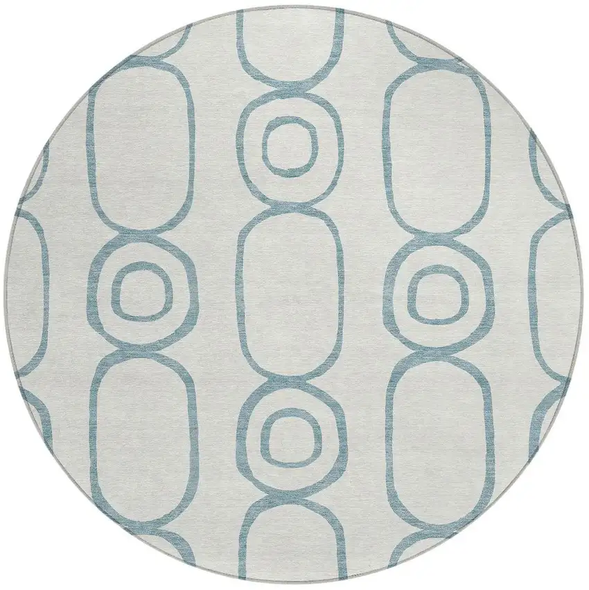 8' Teal Blue And Ivory Round Geometric Washable Indoor Outdoor Area Rug Photo 4