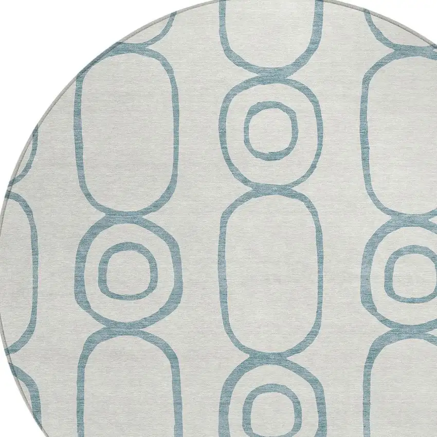 8' Teal Blue And Ivory Round Geometric Washable Indoor Outdoor Area Rug Photo 7