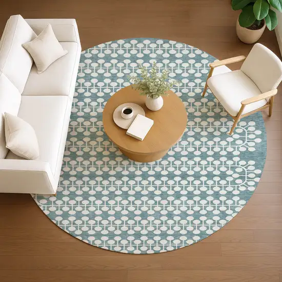 8' Teal Blue And Ivory Round Geometric Washable Indoor Outdoor Area Rug Photo 8