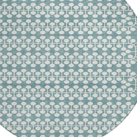 8' Teal Blue And Ivory Round Geometric Washable Indoor Outdoor Area Rug Photo 6