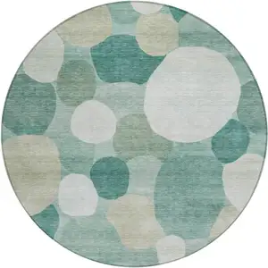 Photo of 8' Teal Blue And Ivory Round Geometric Washable Indoor Outdoor Area Rug