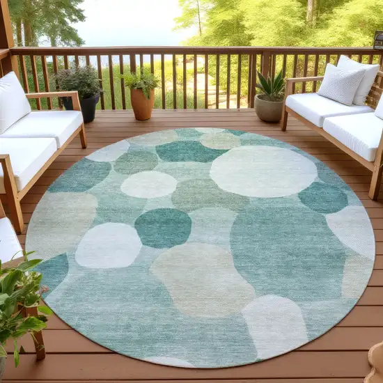 8' Teal Blue And Ivory Round Geometric Washable Indoor Outdoor Area Rug Photo 4