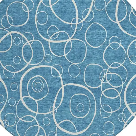 8' Teal Blue And Ivory Round Geometric Washable Indoor Outdoor Area Rug Photo 2
