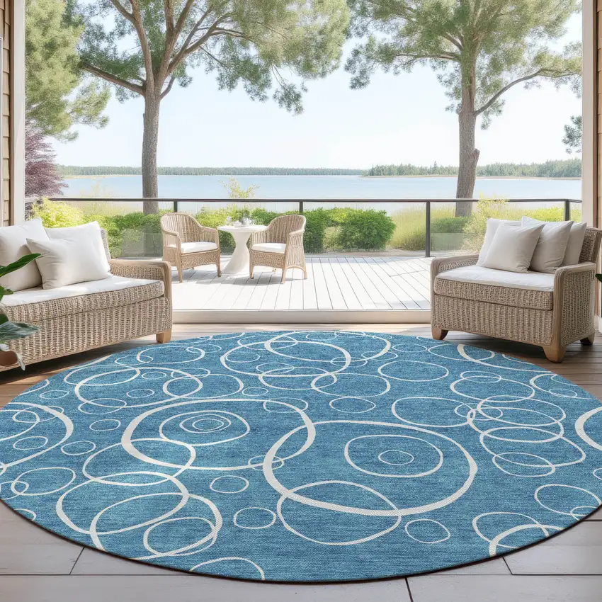 8' Teal Blue And Ivory Round Geometric Washable Indoor Outdoor Area Rug Photo 4