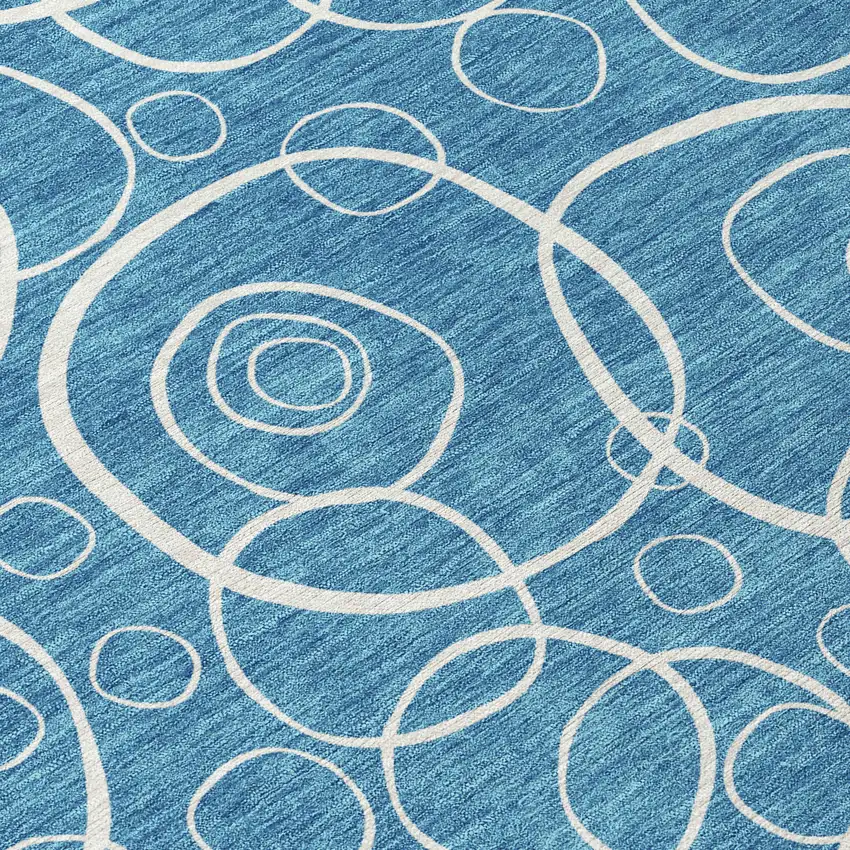 8' Teal Blue And Ivory Round Geometric Washable Indoor Outdoor Area Rug Photo 9