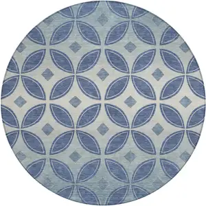Photo of 8' Teal Blue And Ivory Round Geometric Washable Indoor Outdoor Area Rug
