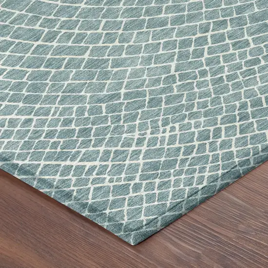 8' Teal Blue And Ivory Round Geometric Washable Indoor Outdoor Area Rug Photo 6