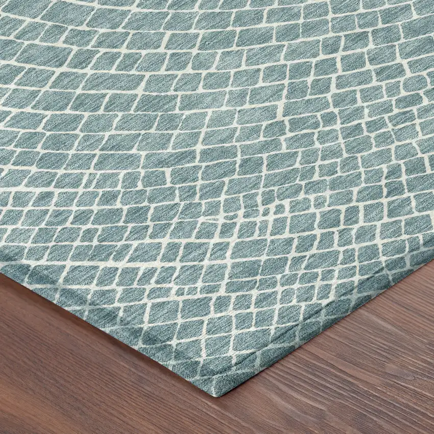 8' Teal Blue And Ivory Round Geometric Washable Indoor Outdoor Area Rug Photo 6