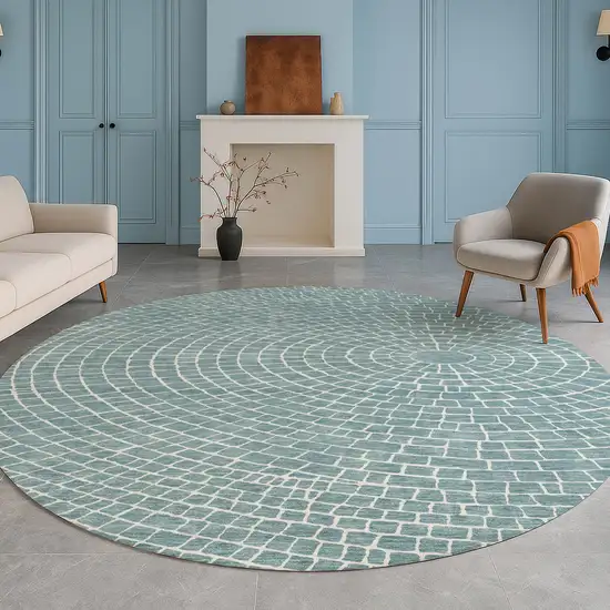 8' Teal Blue And Ivory Round Geometric Washable Indoor Outdoor Area Rug Photo 5