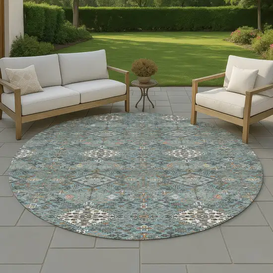 8' Teal Blue And Ivory Round Geometric Washable Indoor Outdoor Area Rug Photo 4