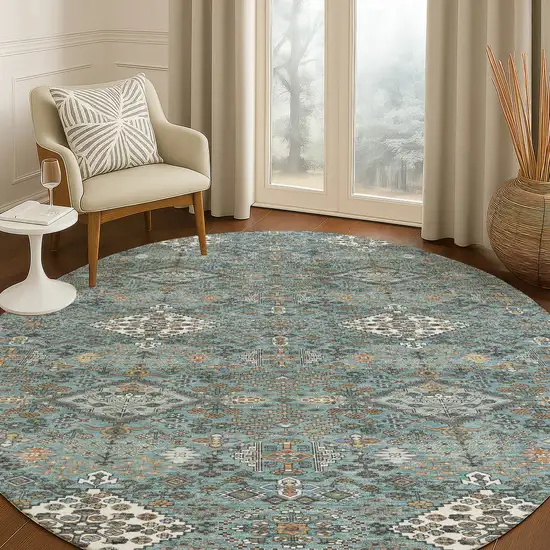 8' Teal Blue And Ivory Round Geometric Washable Indoor Outdoor Area Rug Photo 5