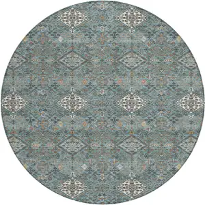 Photo of 8' Teal Blue And Ivory Round Geometric Washable Indoor Outdoor Area Rug
