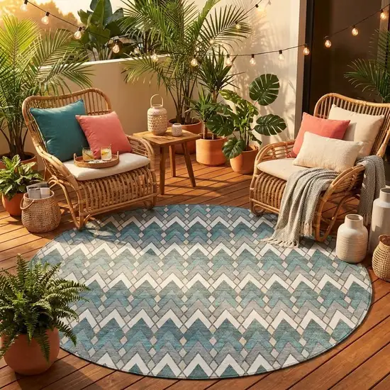 8' Teal Blue And Ivory Round Geometric Washable Indoor Outdoor Area Rug Photo 1