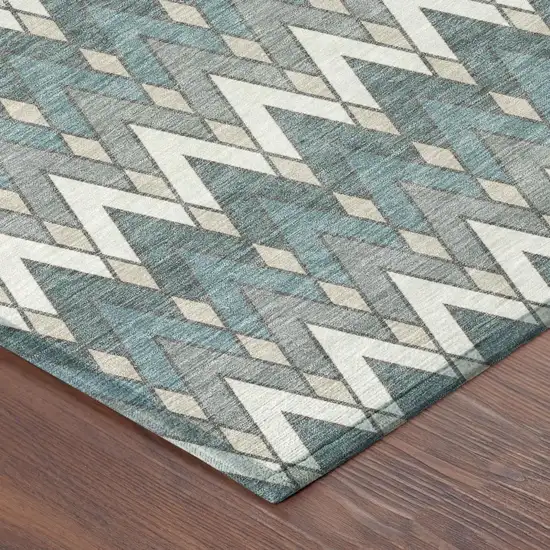 8' Teal Blue And Ivory Round Geometric Washable Indoor Outdoor Area Rug Photo 5