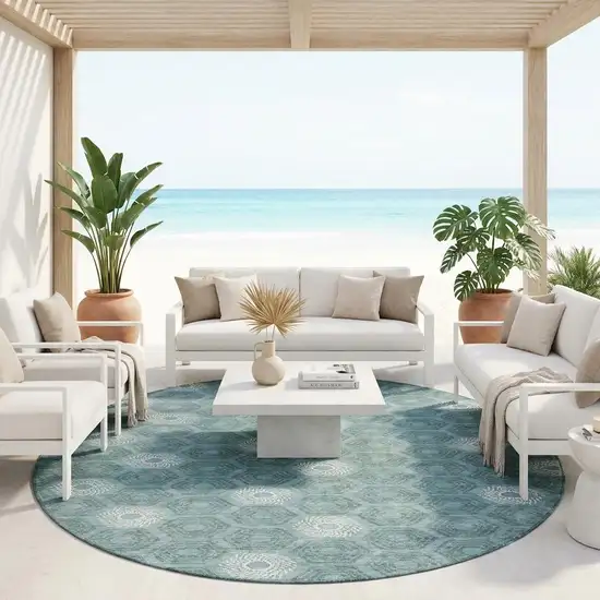 8' Teal Blue And Ivory Round Geometric Washable Indoor Outdoor Area Rug Photo 1