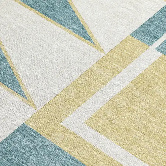 8' Teal Blue And Ivory Round Geometric Washable Indoor Outdoor Area Rug Photo 3