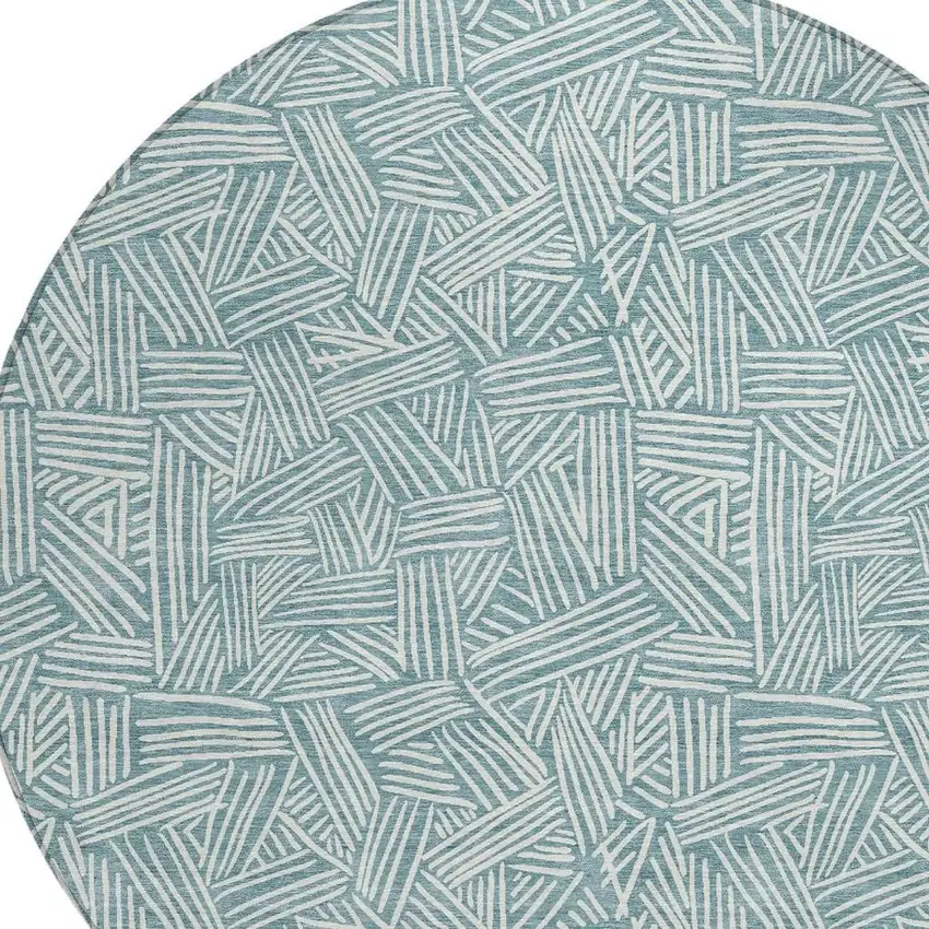 8' Teal Blue And Ivory Round Geometric Washable Indoor Outdoor Area Rug Photo 5