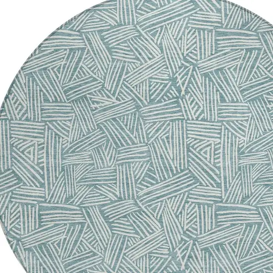 8' Teal Blue And Ivory Round Geometric Washable Indoor Outdoor Area Rug Photo 5