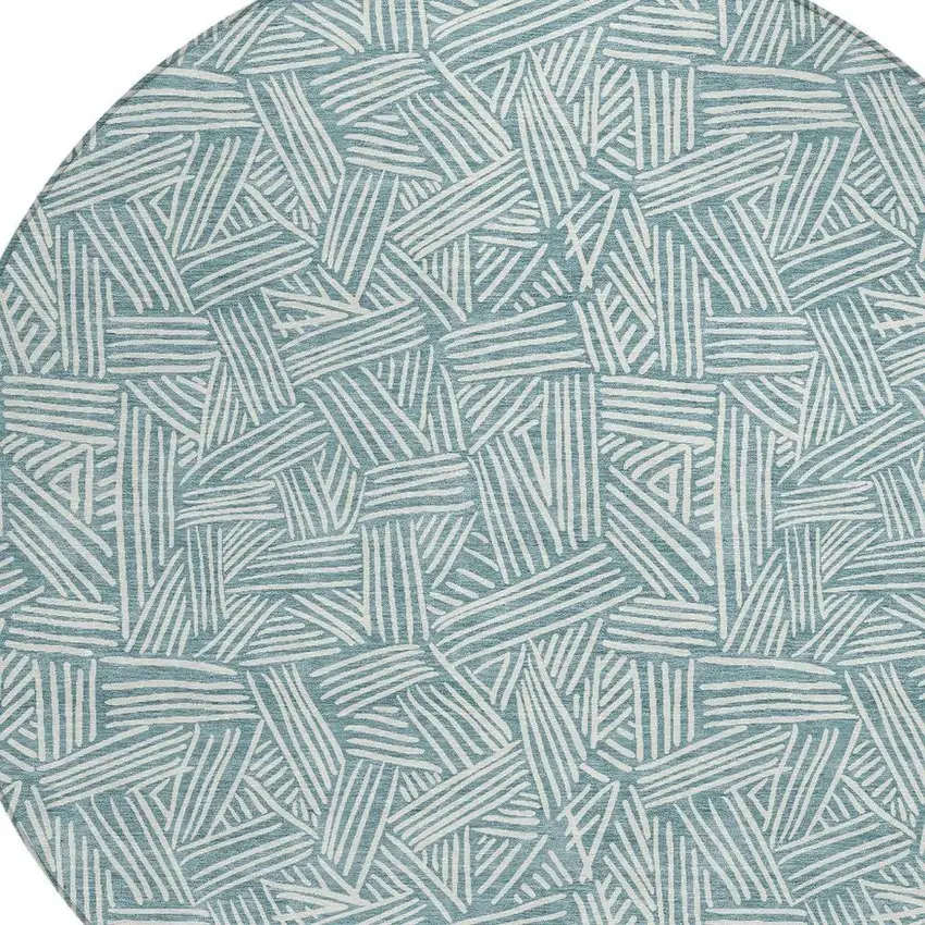8' Teal Blue And Ivory Round Geometric Washable Indoor Outdoor Area Rug Photo 4