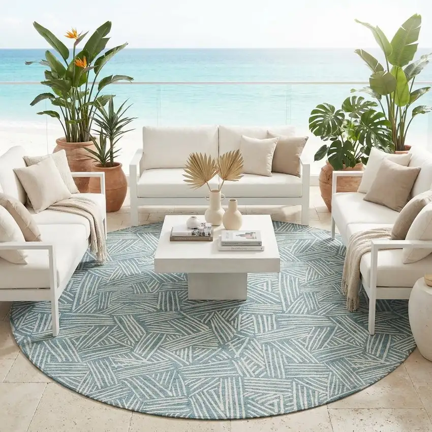 8' Teal Blue And Ivory Round Geometric Washable Indoor Outdoor Area Rug Photo 1