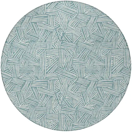 8' Teal Blue And Ivory Round Geometric Washable Indoor Outdoor Area Rug Photo 3